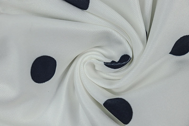 A-line dress with waist cinching and pleats