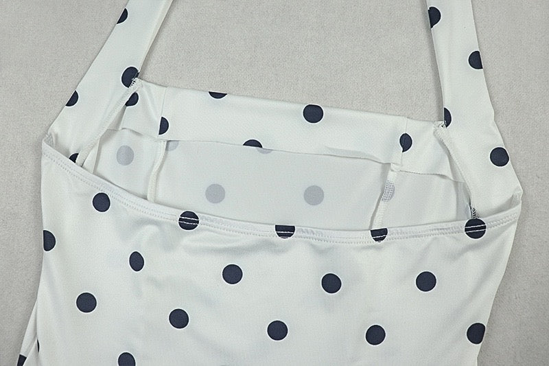 A-line dress with waist cinching and pleats