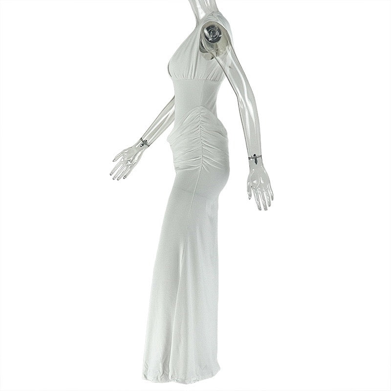 Shaping pleated full-skirted dress with a sexy V-neck and elegant style.