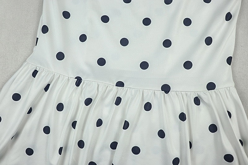 A-line dress with waist cinching and pleats