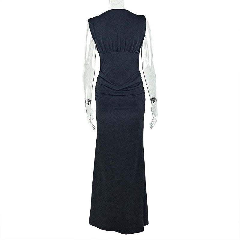 Shaping pleated full-skirted dress with a sexy V-neck and elegant style.