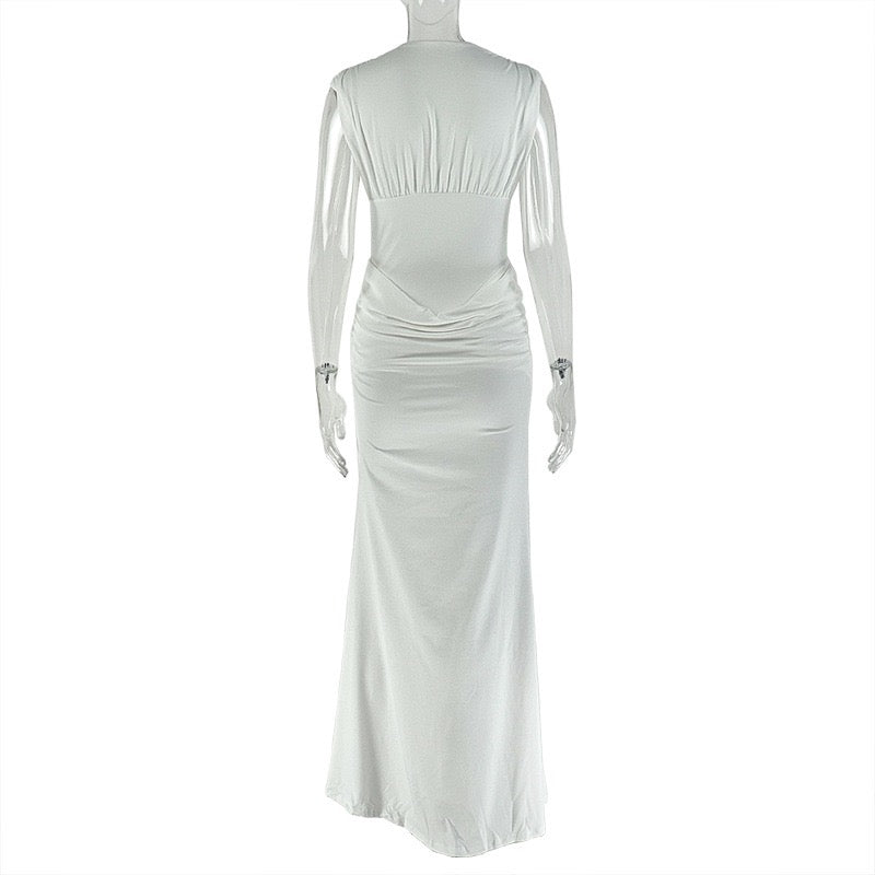 Shaping pleated full-skirted dress with a sexy V-neck and elegant style.