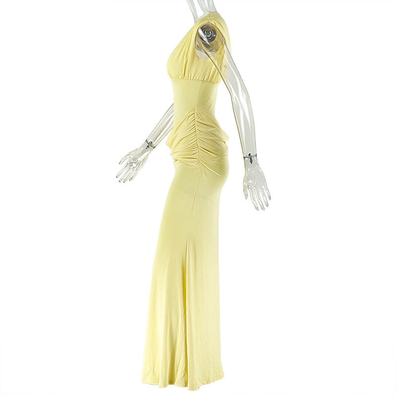 Shaping pleated full-skirted dress with a sexy V-neck and elegant style.