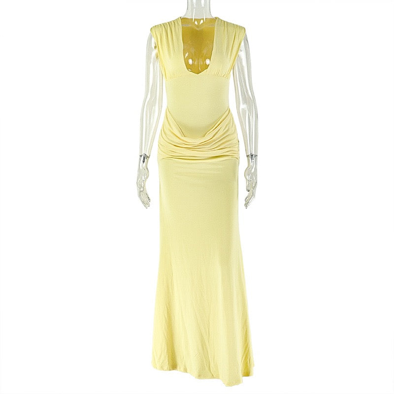 Shaping pleated full-skirted dress with a sexy V-neck and elegant style.