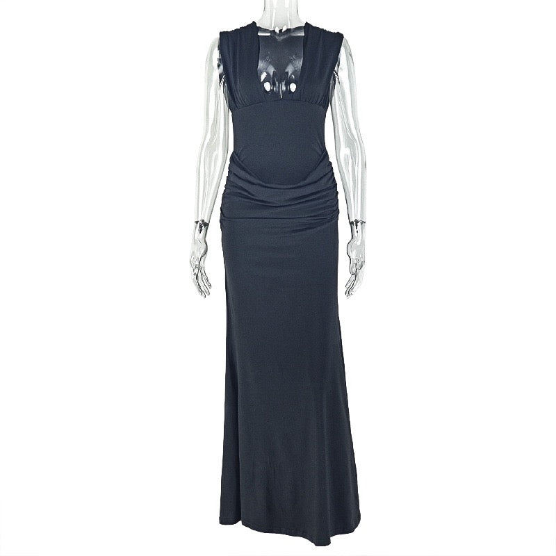 Shaping pleated full-skirted dress with a sexy V-neck and elegant style.